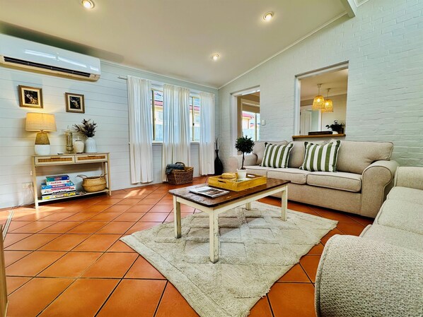 Smart TV, fireplace, DVD player, books