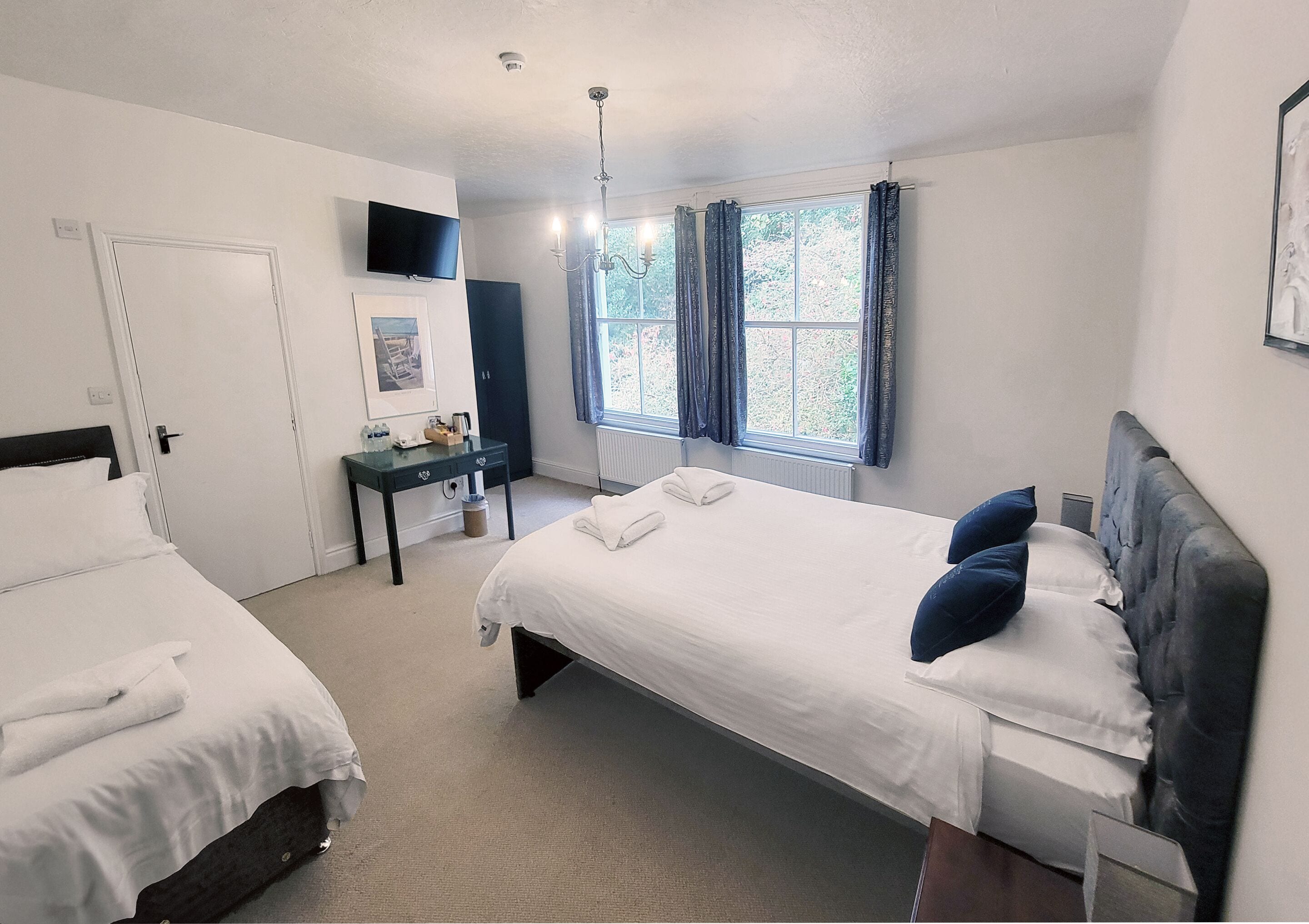 Family Triple Room, Garden View | Iron/ironing board, free WiFi