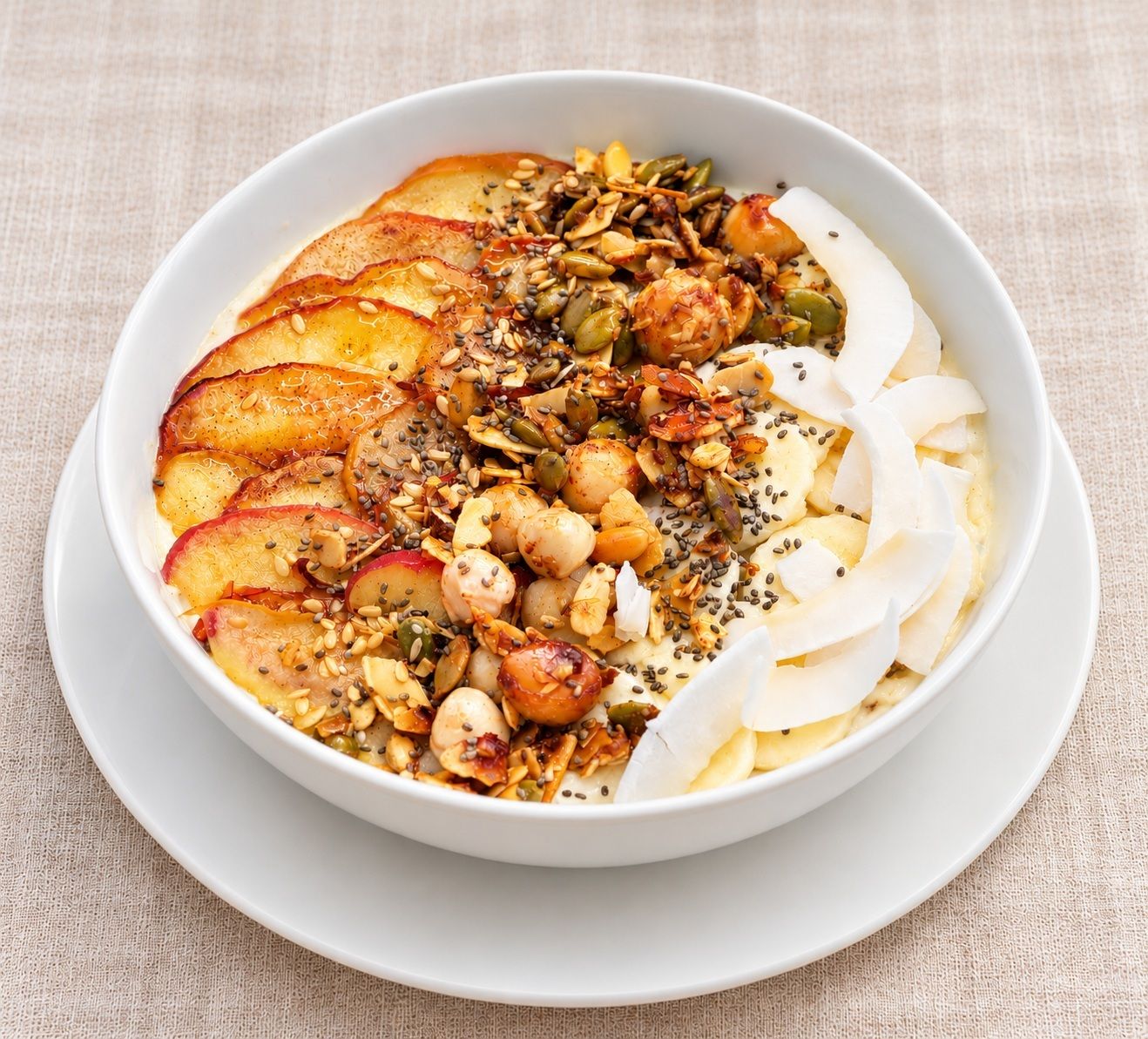 A bowl of food with various toppings.