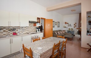 Fridge, stovetop, coffee/tea maker, cookware/dishes/utensils