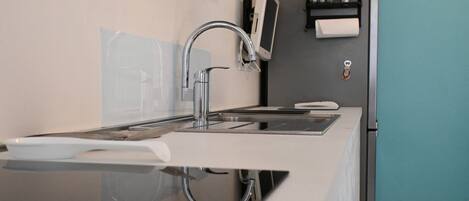 Fridge, oven, dishwasher, dining tables