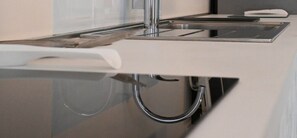 Fridge, oven, dishwasher, dining tables