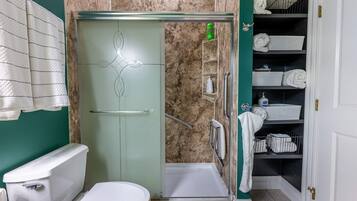 Shower, hair dryer, towels, soap
