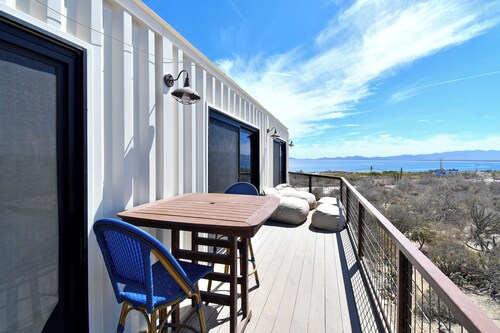 Funnest house in Baja! Game nights w/ smart darts, shuffleboard, & video games. Enjoy a new 8 person hot tub, lounge on multiple decks w/ firepits, fast Wifi ( 250 mb+)w/ Starlink backup. Use of 2 SUPs.  Daily housekeeping optional.