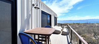 Funnest house in Baja! Game nights w/ smart darts, shuffleboard, & video games. Enjoy a new 8 person hot tub, lounge on multiple decks w/ firepits, fast Wifi ( 250 mb+)w/ Starlink backup. Use of 2 SUPs. Daily housekeeping optional.