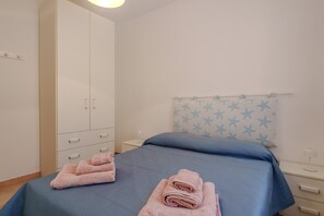 2 habitaciones y ropa de cama