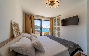 2 bedrooms, iron/ironing board, travel crib, free WiFi