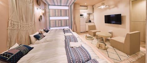 Economy Quadruple Room | Laptop workspace, free WiFi, bed sheets