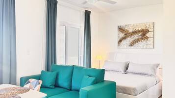 Comfort Studio, 1 Queen Bed, Pool View | Living area | Flat-screen TV, streaming services