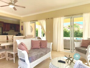 Classic Villa, Patio, Garden View | Living area | Flat-screen TV, streaming services - Rheia Properties - Sosua Ocean Village (Sosúa)