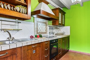Fridge, microwave, oven, cookware/dishes/utensils