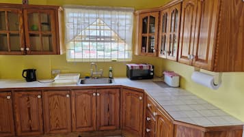 Microwave, stovetop, coffee/tea maker, electric kettle