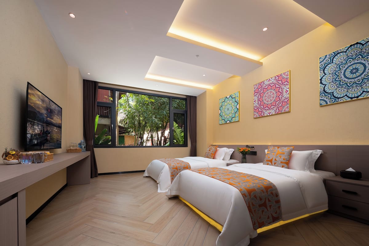 Classic Twin Room, Garden View | Desk, blackout curtains, iron/ironing board, free WiFi