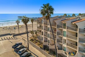 On the beach, sun-loungers, beach towels