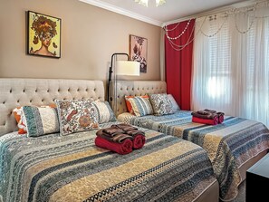 3 bedrooms, desk, iron/ironing board, travel cot