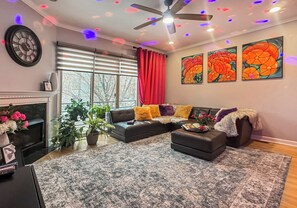 Smart TV, fireplace, table football, books