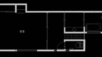 Ein Grundriss mit einer Küche, einem Essbereich und einem Wohnzimmer.