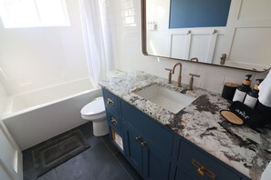 Hair dryer, bidet, towels, soap