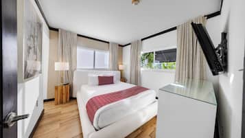 Suite, 2 Bedrooms | 2 bedrooms, desk, laptop workspace, iron/ironing board