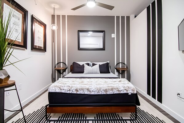 1 bedroom, desk, iron/ironing board, travel crib