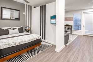 1 bedroom, desk, iron/ironing board, travel crib