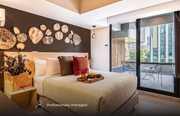 1 bedroom, desk, iron/ironing board, travel crib