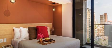 1 bedroom, desk, iron/ironing board, travel crib