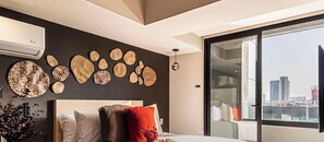 1 bedroom, desk, iron/ironing board, travel crib