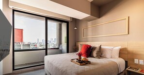 1 bedroom, desk, iron/ironing board, travel crib