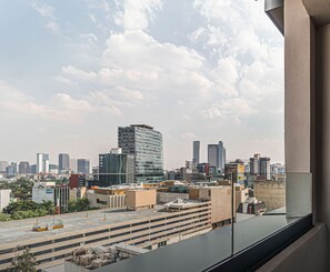 Panoramic city views from a high-rise building, offering a glimpse into a bustling urban landscape.