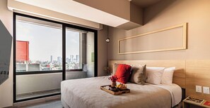 1 bedroom, desk, iron/ironing board, travel crib