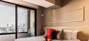 1 bedroom, desk, iron/ironing board, travel crib