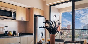 Fridge, microwave, stovetop, coffee/tea maker