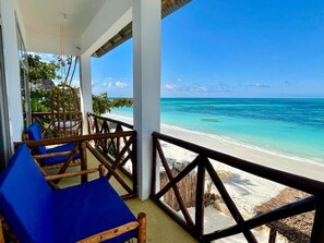 Deluxe Double Room, Beach View | Terrace/patio - Aquelia Rose Hotel (Jambiani)