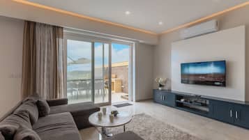 Family Villa, Multiple Bedrooms (Magnifica Gozitan Villa Pool And) | Living area | 21-inch flat-screen TV with digital channels, fireplace