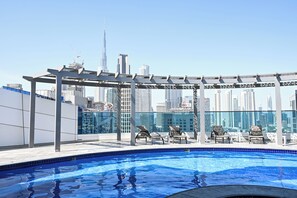 Pool - Luxury 1BR Near Burj Khalifa with Canal Views (Dubai)
