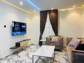 Family Apartment, Balcony, City View | Living area - AZ KINGS HOTEL AND APARTMENT (Benin City)