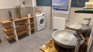 Shower, hair dryer, towels