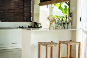 Fridge, microwave, stovetop, coffee/tea maker