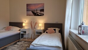 2 bedrooms, desk, iron/ironing board, travel crib