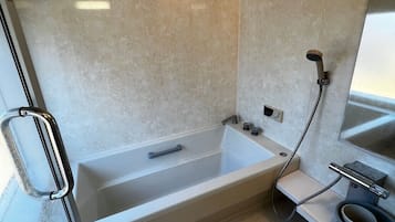 Hair dryer, towels, soap, shampoo