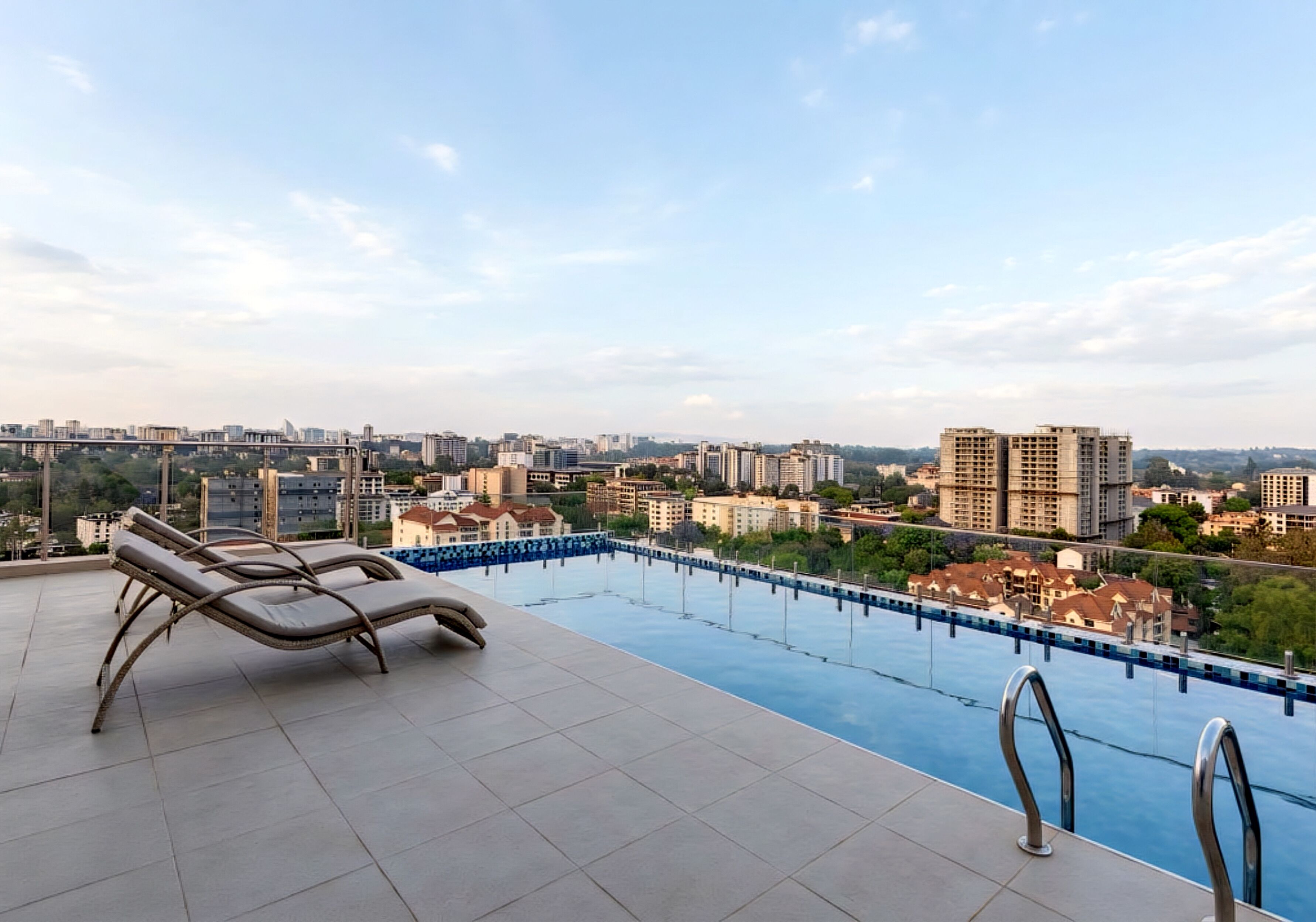 Swim above the city 🌇 Enjoy our relaxing rooftop pool.