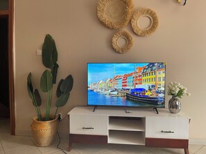 Interior - Cozy 2-bedroom roadside apartment with WiFi in Naalya,right next to Quality mall (Kampala)