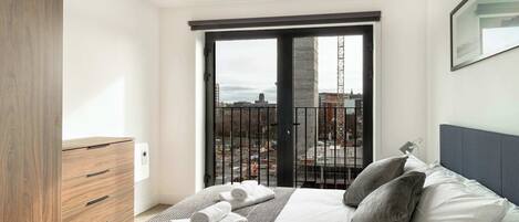 2 dormitorios, tabla de planchar con plancha, wifi y ropa de cama