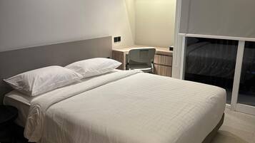 Deluxe Room | In-room safe, desk, laptop workspace, iron/ironing board
