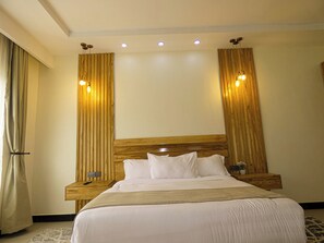 Luxury Double Room, Balcony | In-room safe, desk, laptop workspace, soundproofing - RITZY ARCADIA COTTAGES (Arusha)