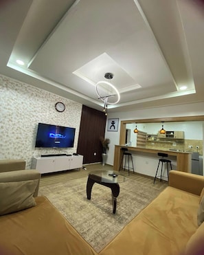 Family Apartment, Balcony, City View | Living area