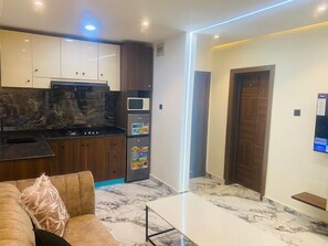 Familienapartment, Balkon, Stadtblick | Wohnbereich