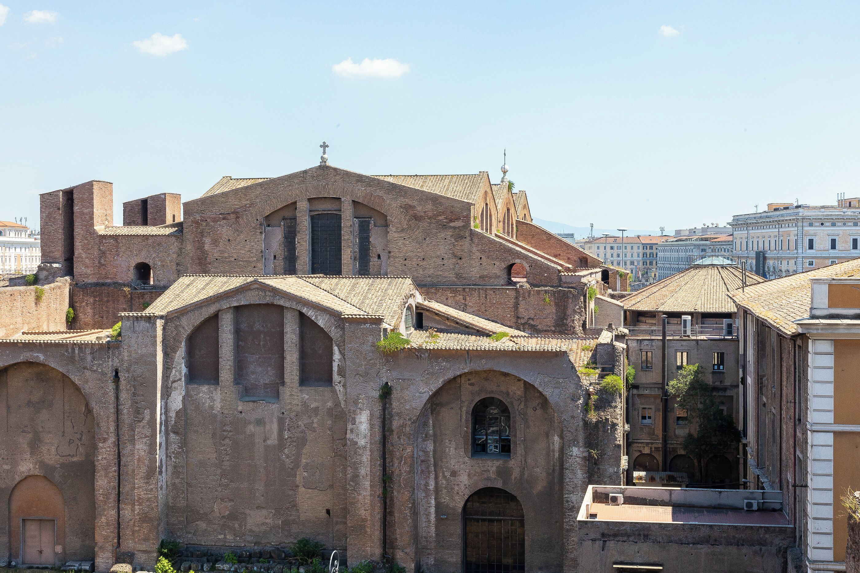 A historic building with arched windows and a brick facade.