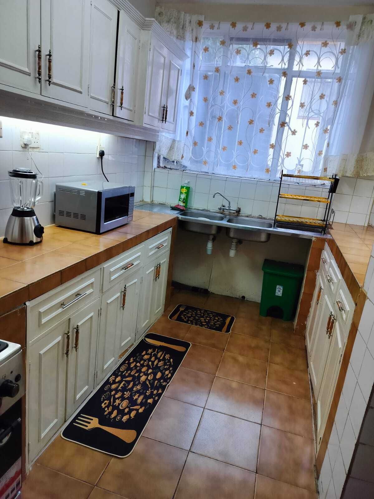 Classic Apartment | Private kitchen | Fridge, microwave, dining tables